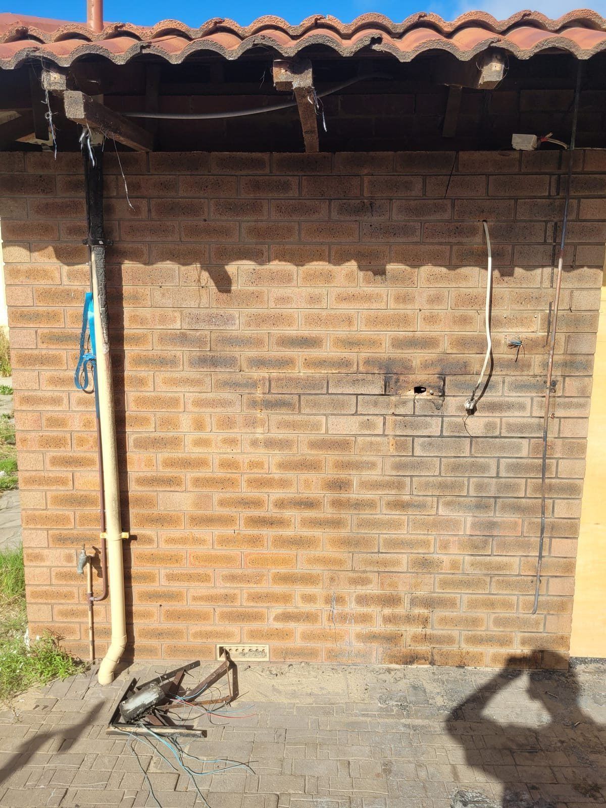 Clean brick exterior wall after laser soot removal